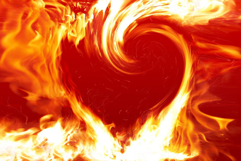 Passion represented by fire heart